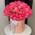 Композиция в шляпной коробке из 113 пионов Корал Шарм в Павловском Посаде