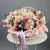 Композиция в корзине "Диодора" из французских роз Квиксенд, диантусов и кустовых пионовидных роз Бомбастик в Павловском Посаде